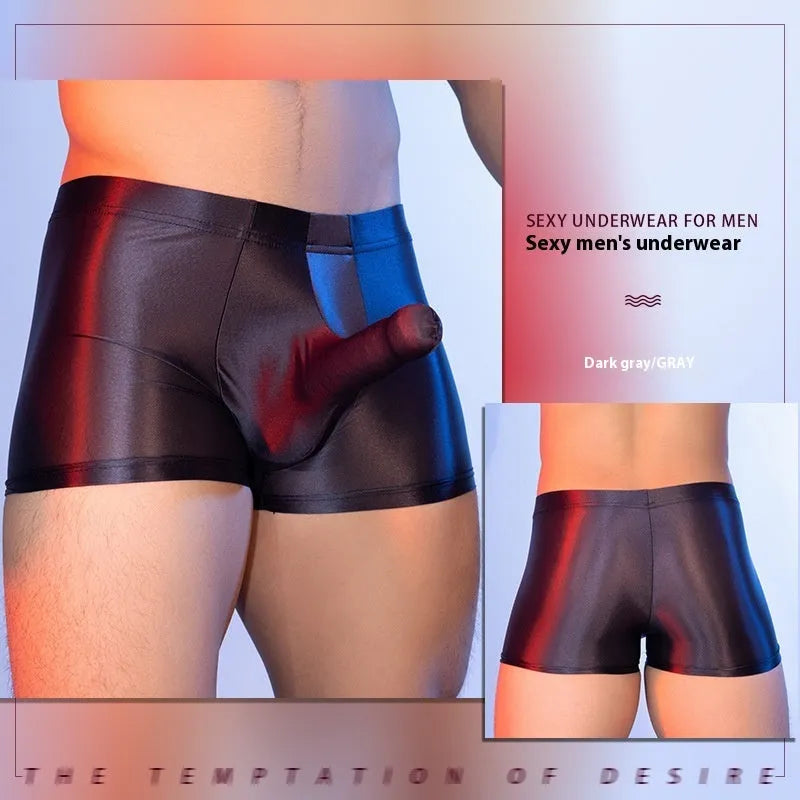 Men's red nylon elephant nose boxer shorts on a white background.