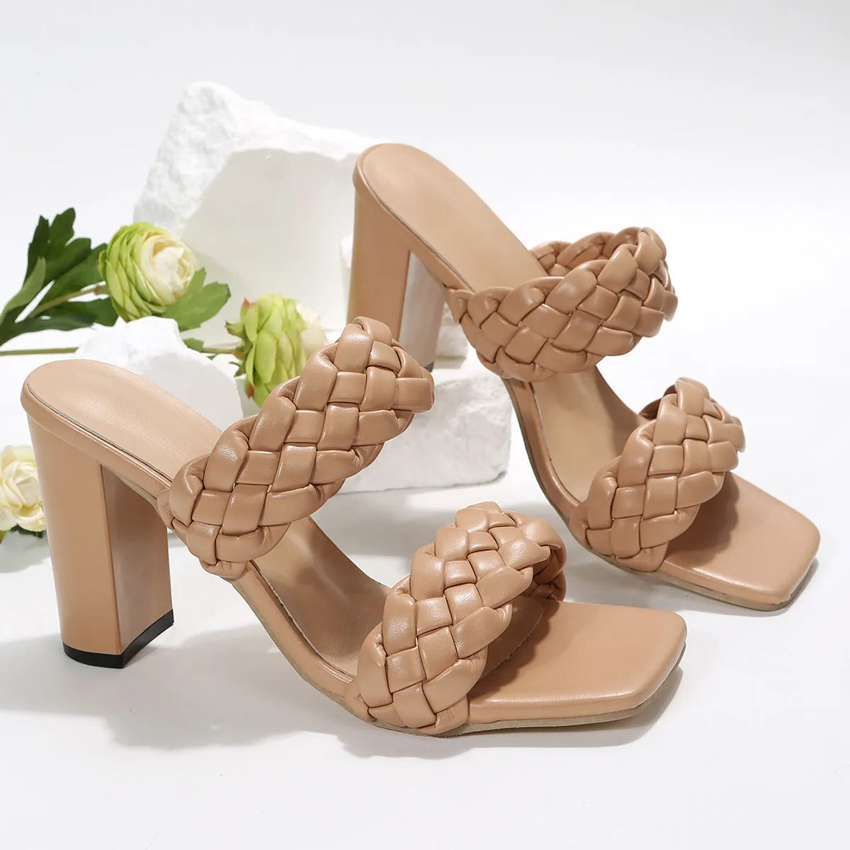 Women's square toe flip flops with chunky heel and woven twisted strap in white and apricot colours.