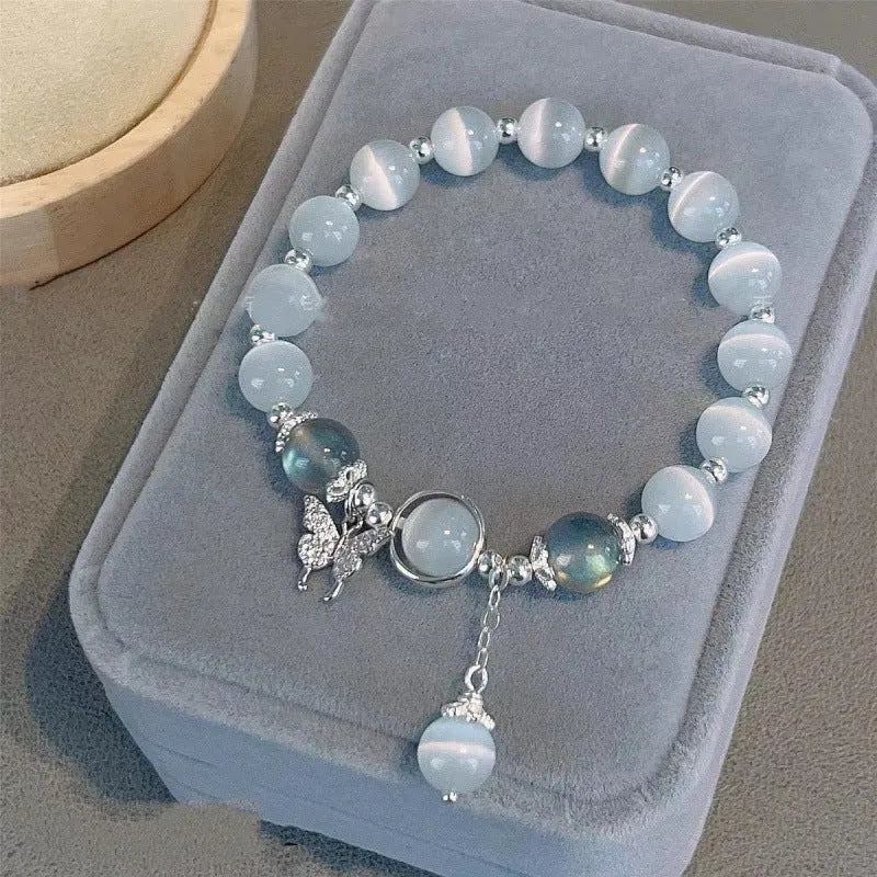 Handmade Chinese style glass bracelet with bamboo joint beads in a red Lvzhu Duobao design.