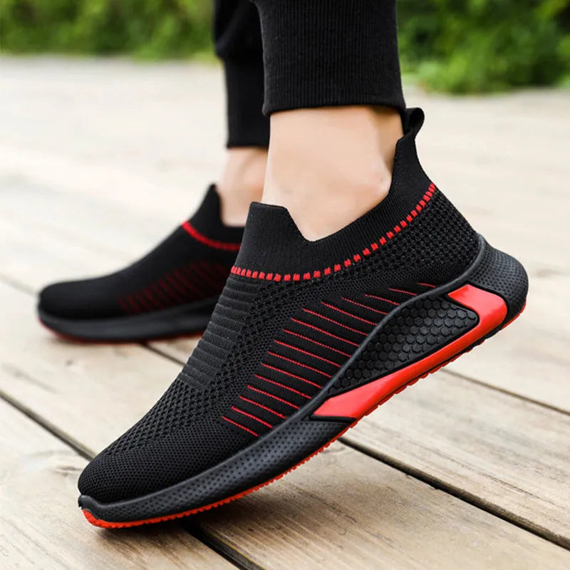 Men's low-top mesh sock sneakers with striped design and Flyknit upper.