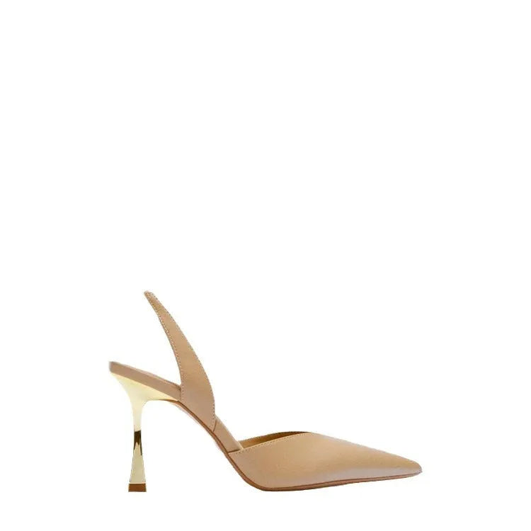 Apricot and black patent leather pointed high heels with a shallow-cut vamp, shown from the side.
