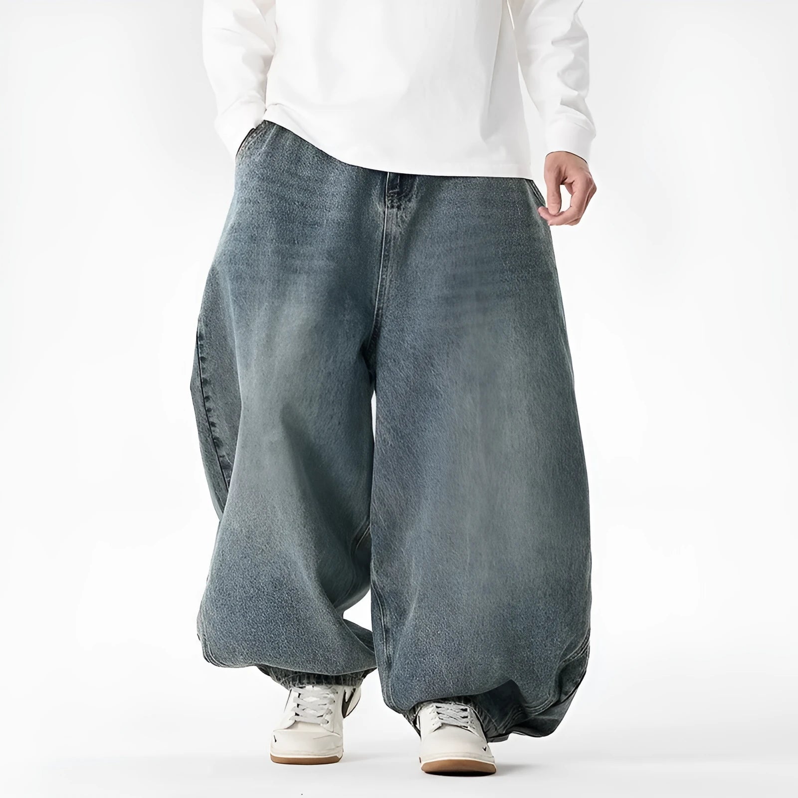 Men's plus-size light blue baggy jeans with a straight leg and zip fly