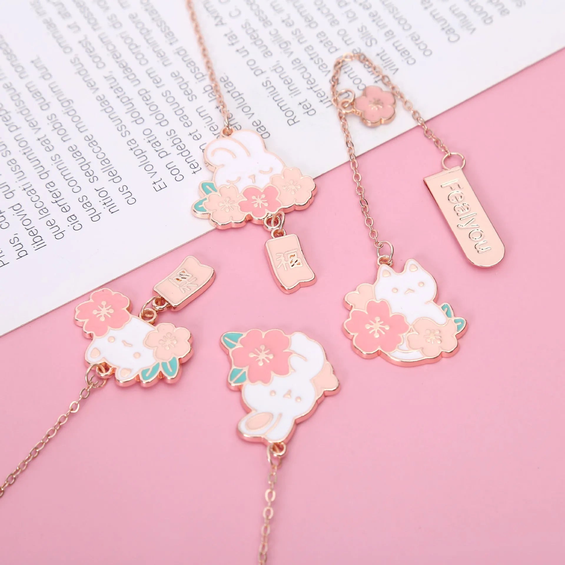 Metal pendant bookmark with cherry blossom cartoon cat design and matching book holder