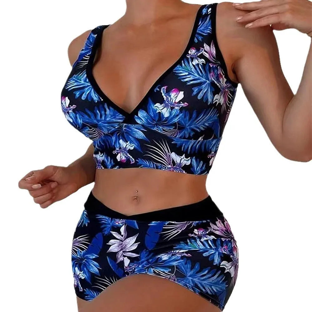Women's two-piece printed swimsuit set with sleeveless top and boxer shorts in a multi-colour design.