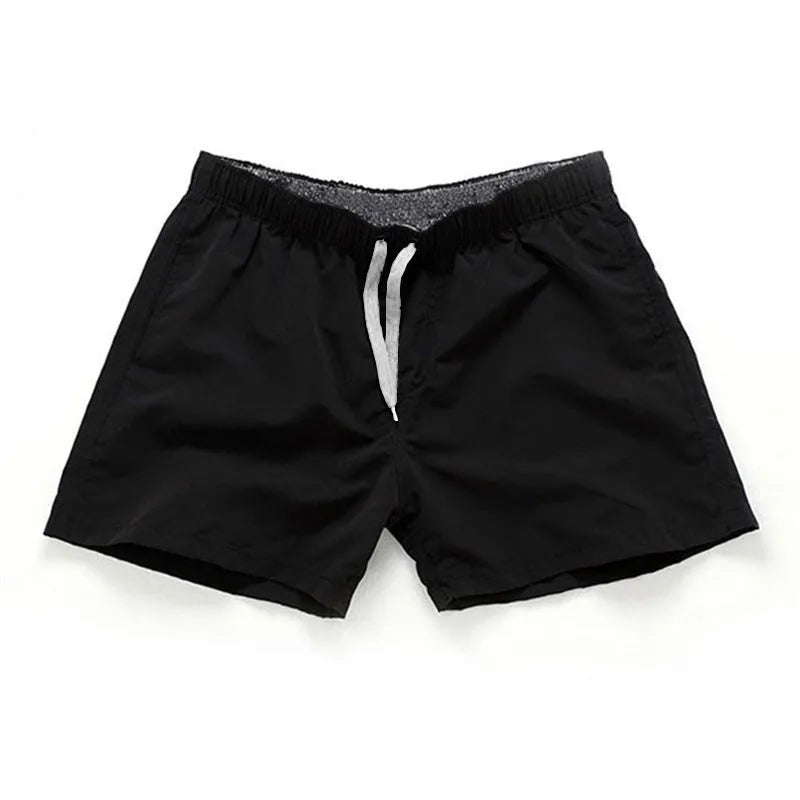 Men's polyester beach shorts in multiple colours with straight leg design for surfing and casual wear