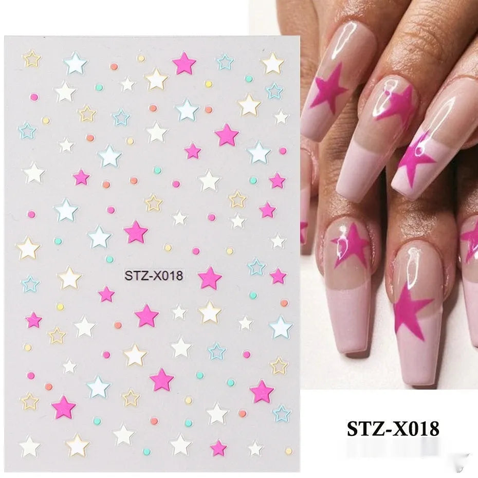 Close-up of a cartoon-style nail sticker with black and silver strips and a love pattern design on a fingernail.