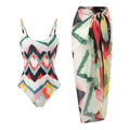 Women's two-piece striped swimsuit with matching hip skirt on beach