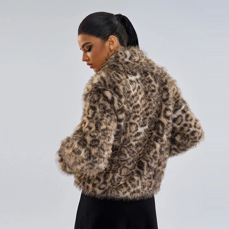 Women's leopard print coat with buckle lapel detail showing normal length street fashion design
