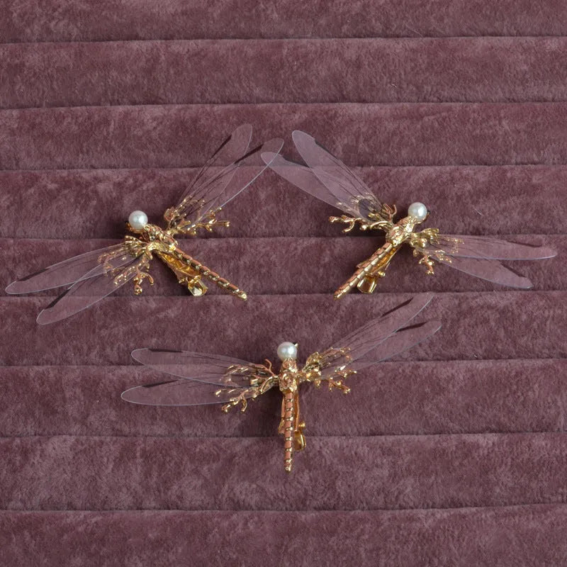 Golden electroplated dragonfly side clip headdress for women with detailed insect design