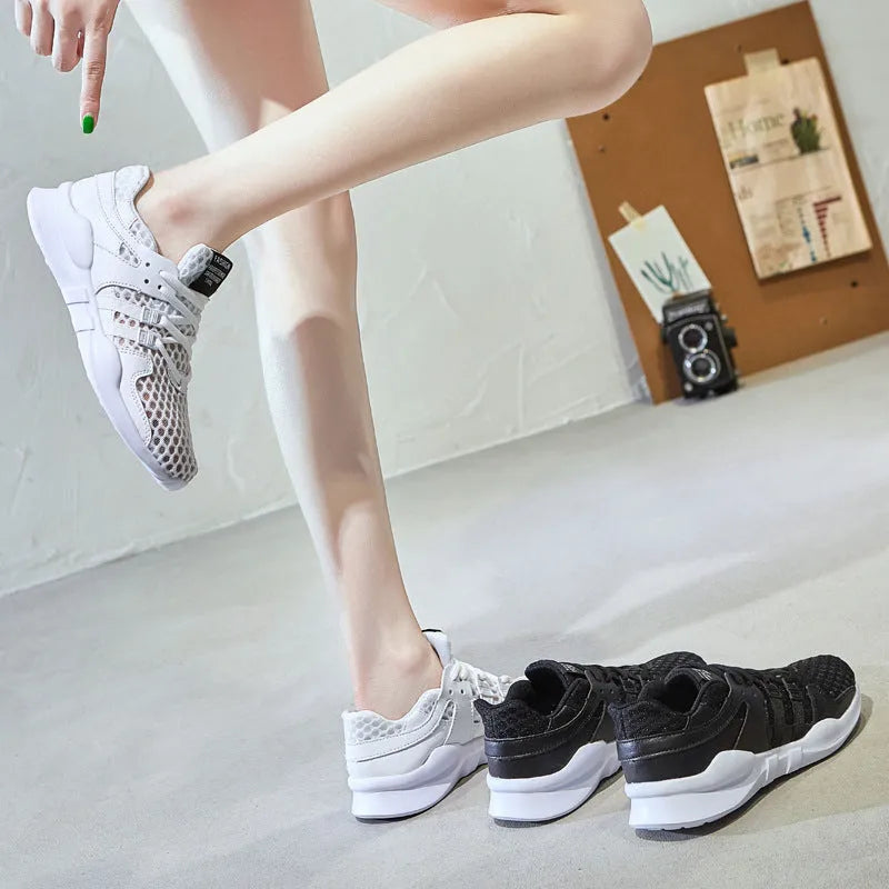 Breathable mesh sneaker with hollow-out design and a flat EVA sole, shown in a light colour on a neutral background.
