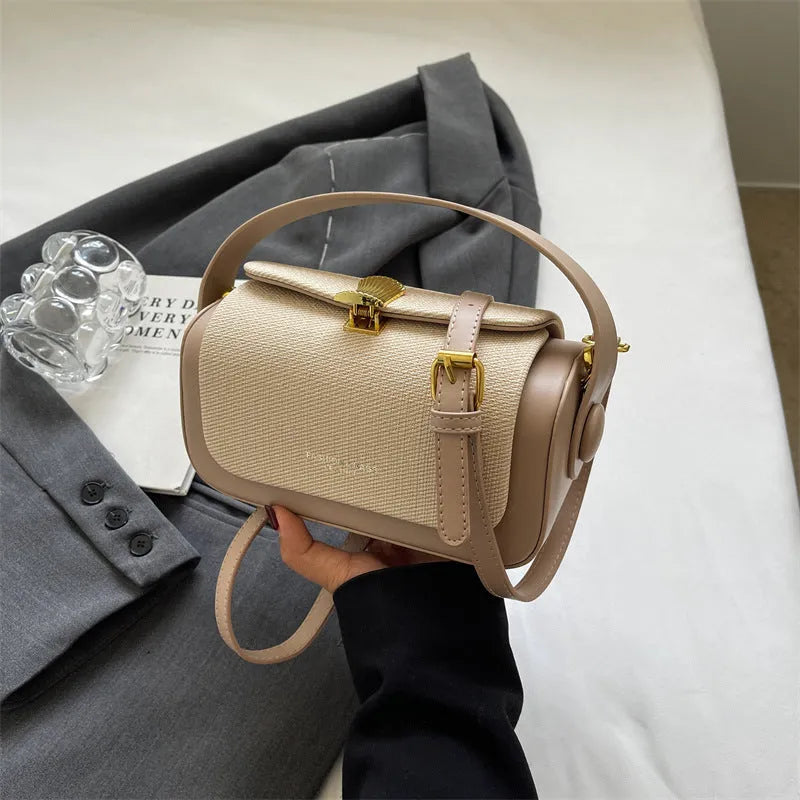 Women's black PU messenger bag with horizontal square shape and crossbody strap
