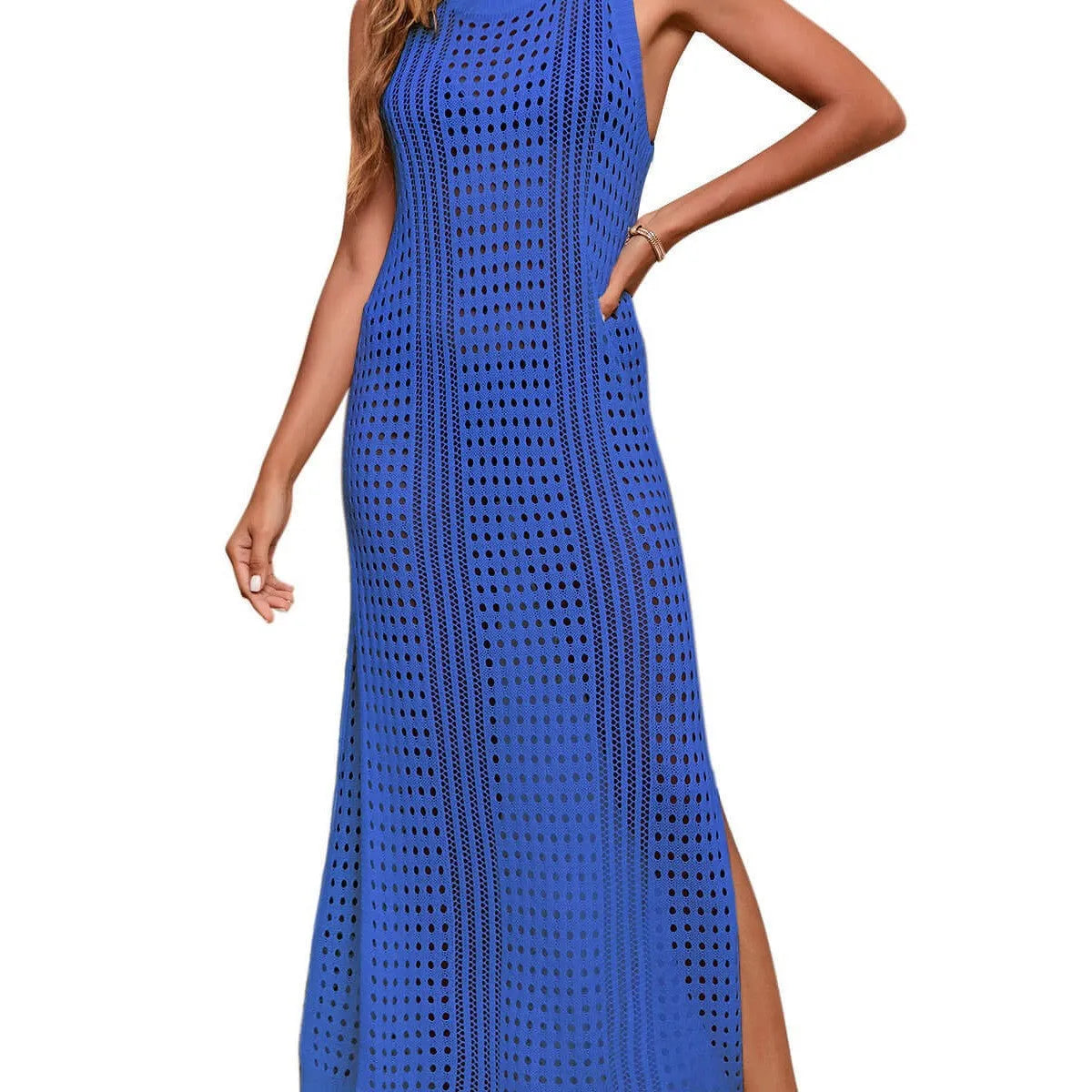 Long loose women's beach blouse in hollow-out knit, shown in a solid colour, laid flat.