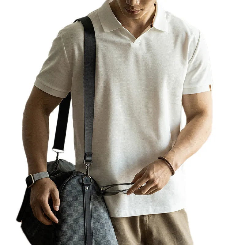 American-style blue cotton polo shirt with short sleeves on hanger