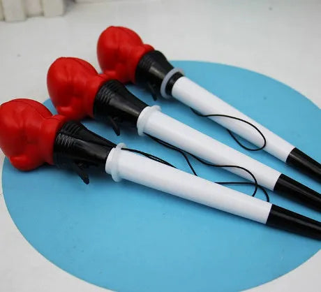 Four pressure relief boxing press ejection pens with black refills and 0.7mm bullet tips