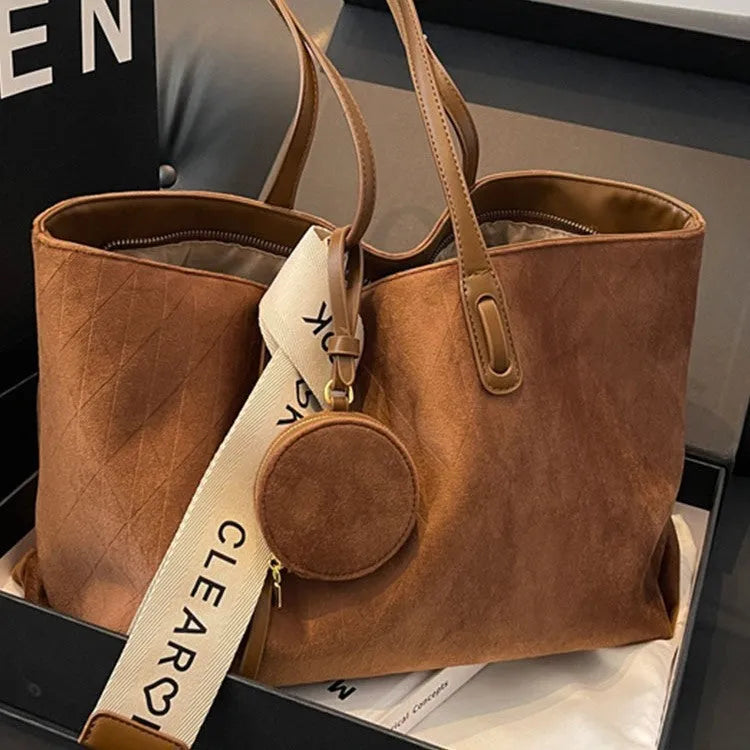 Soft polyester large tote shoulder bag in a horizontal square shape with an external pocket.