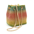 Rhinestone bucket bag with sparkling coverage and adjustable shoulder straps
