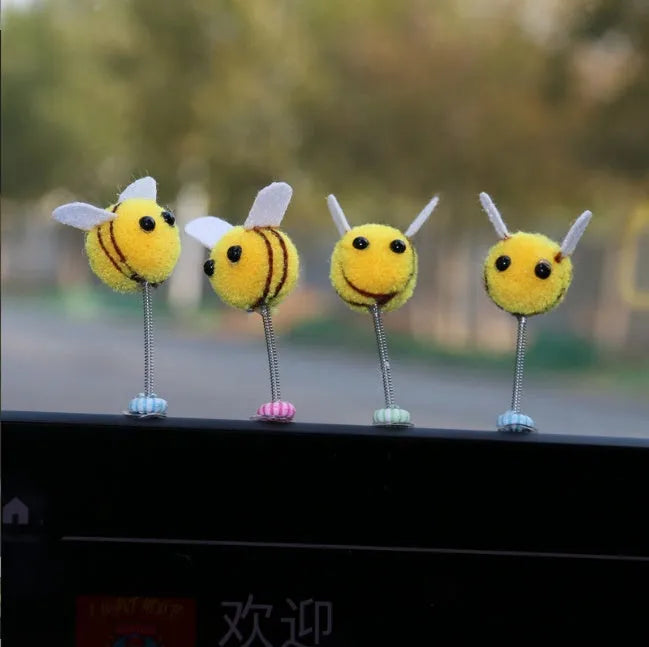 Swing Spring Bee car dashboard decoration showing cartoon bee design on fur ball material