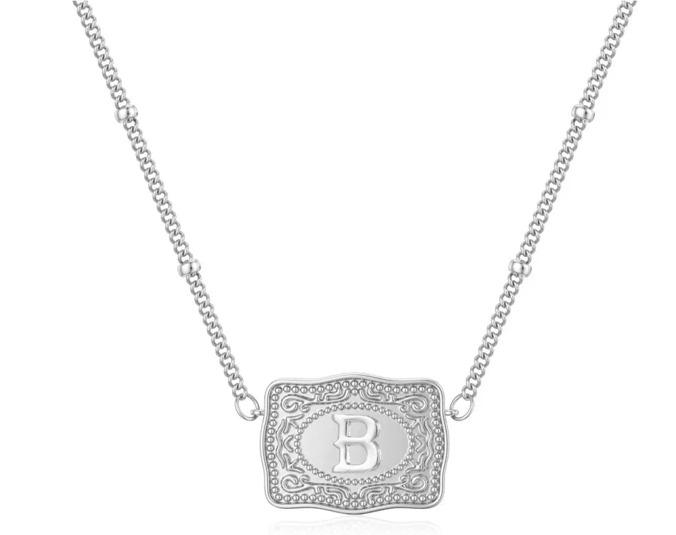 Electroplated copper letter necklace showing a gold charm on a 45 cm chain.