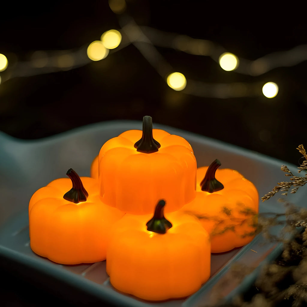 Yellow LED pumpkin light 4.9 cm Christmas decoration electronic candle 12-pack on table