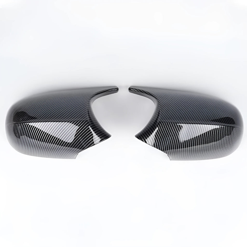 Pair of black ABS plastic rearview mirror shells for BMW 3 Series E90, shown alongside original equipment part numbers.