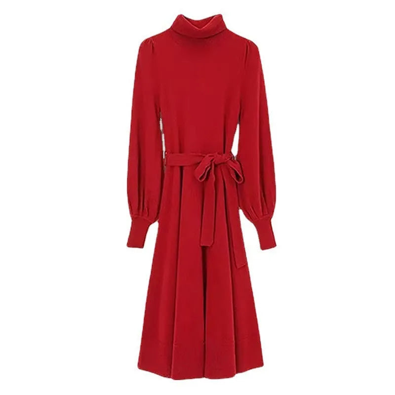 A rose red turtleneck knit dress with long sleeves, an elastic waist, and a loose mid-length skirt.