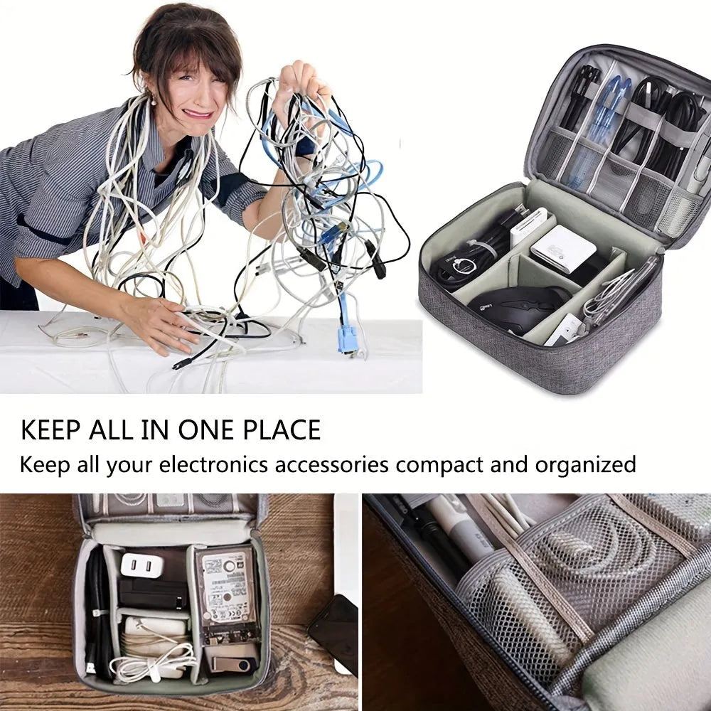 Black and grey waterproof electronics organiser bag open to show removable dividers and mesh pockets for cables.