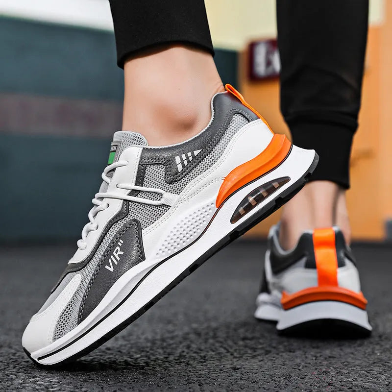 Men's grey and black mesh running shoes with a round toe and lightweight EVA sole on a white background.