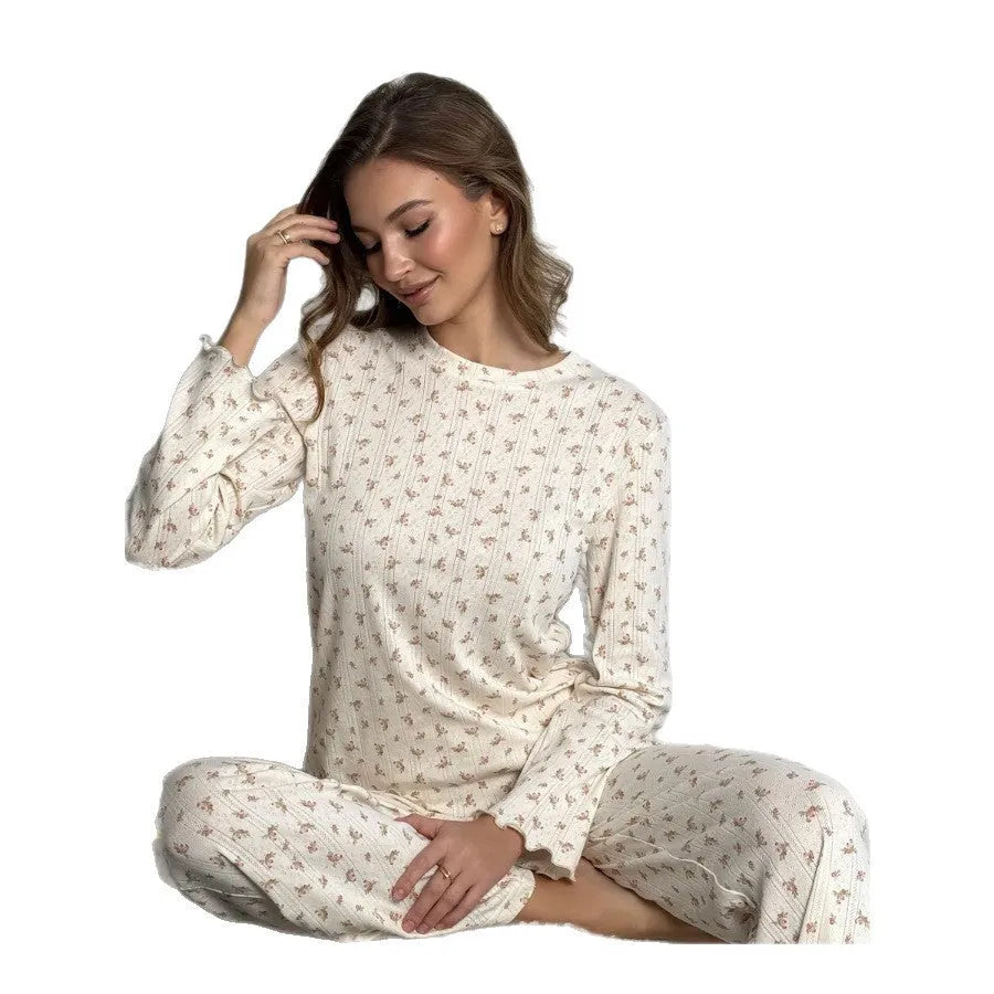 White floral print women's lounge set with bell sleeve top and wide leg trousers