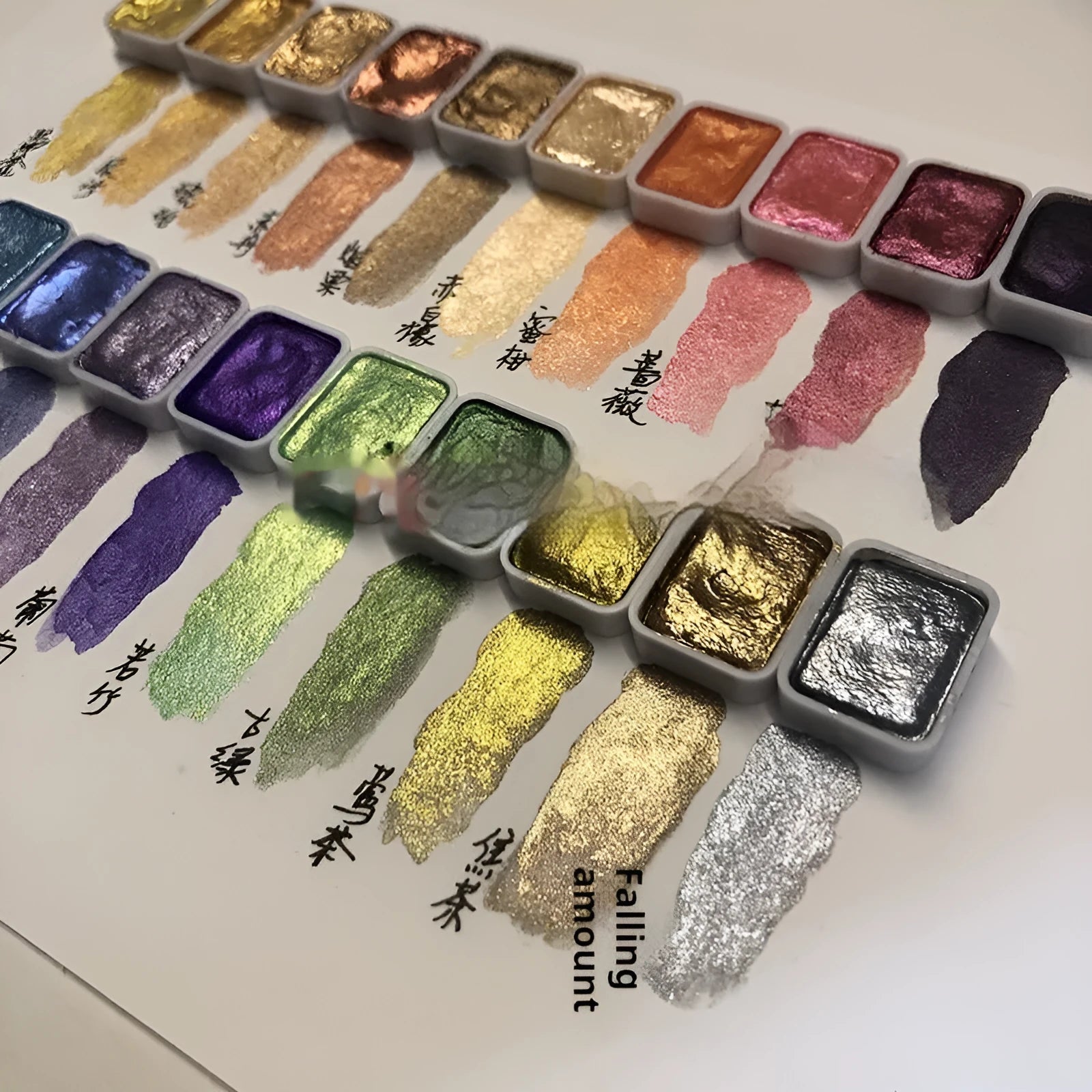 Traditional Chinese painting watercolour set with tubes of red gold, white gold, and pearlescent colours in warm and cold palettes.