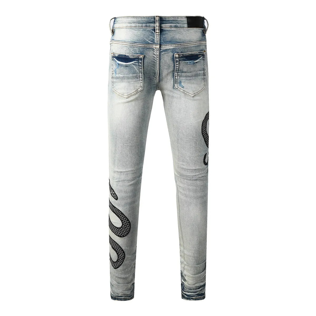 Men's blue distressed skinny jeans with a wash effect and button fly