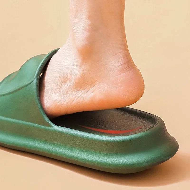 Pair of thickened EVA flip-flop slippers in a chosen colour, showing the non-slip sole and unisex design.