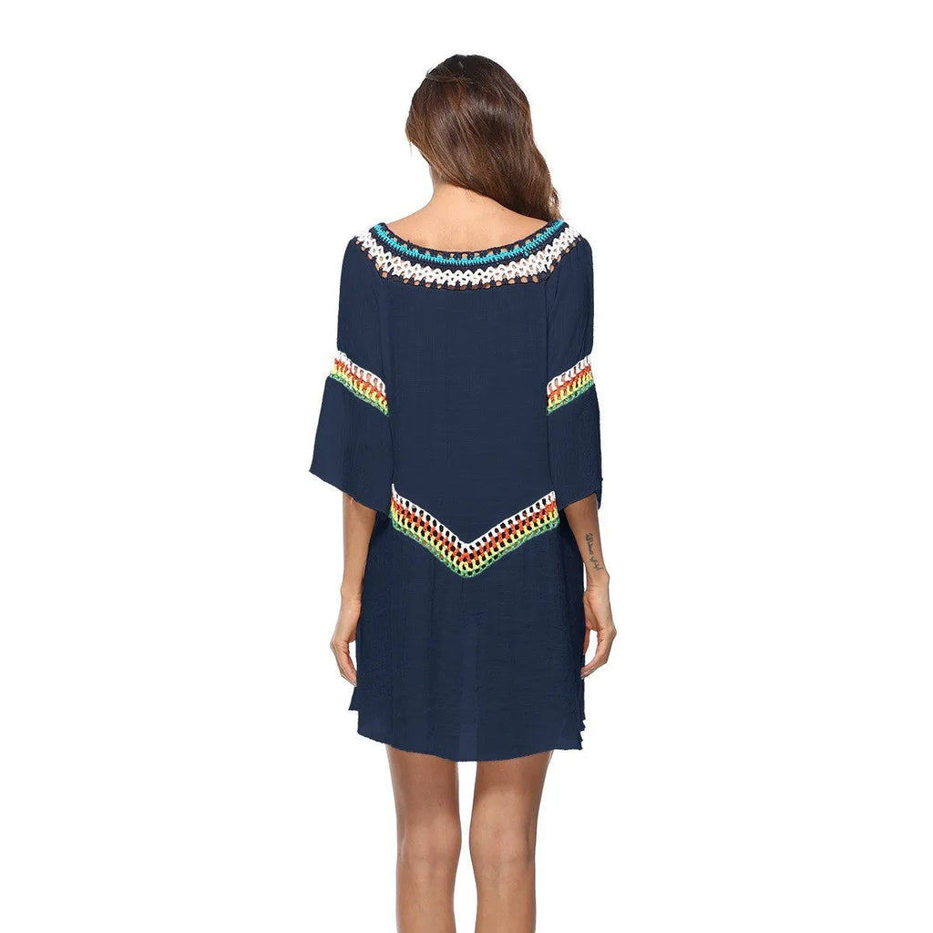 Crocheted white sun protection beach cover-up top for women, loose fit.