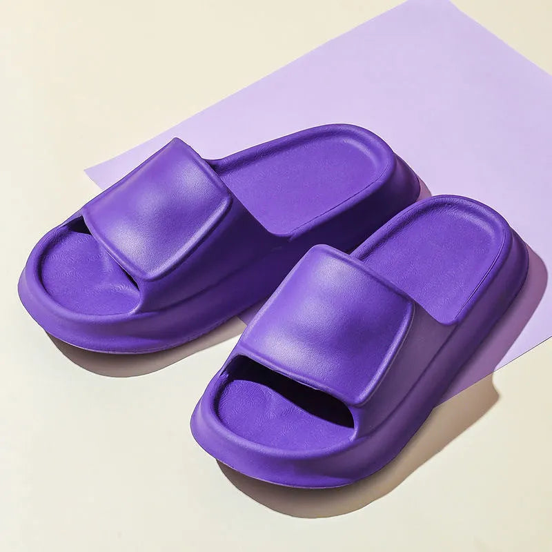 Pair of thickened EVA flip-flop slippers in a chosen colour, showing the non-slip sole and unisex design.