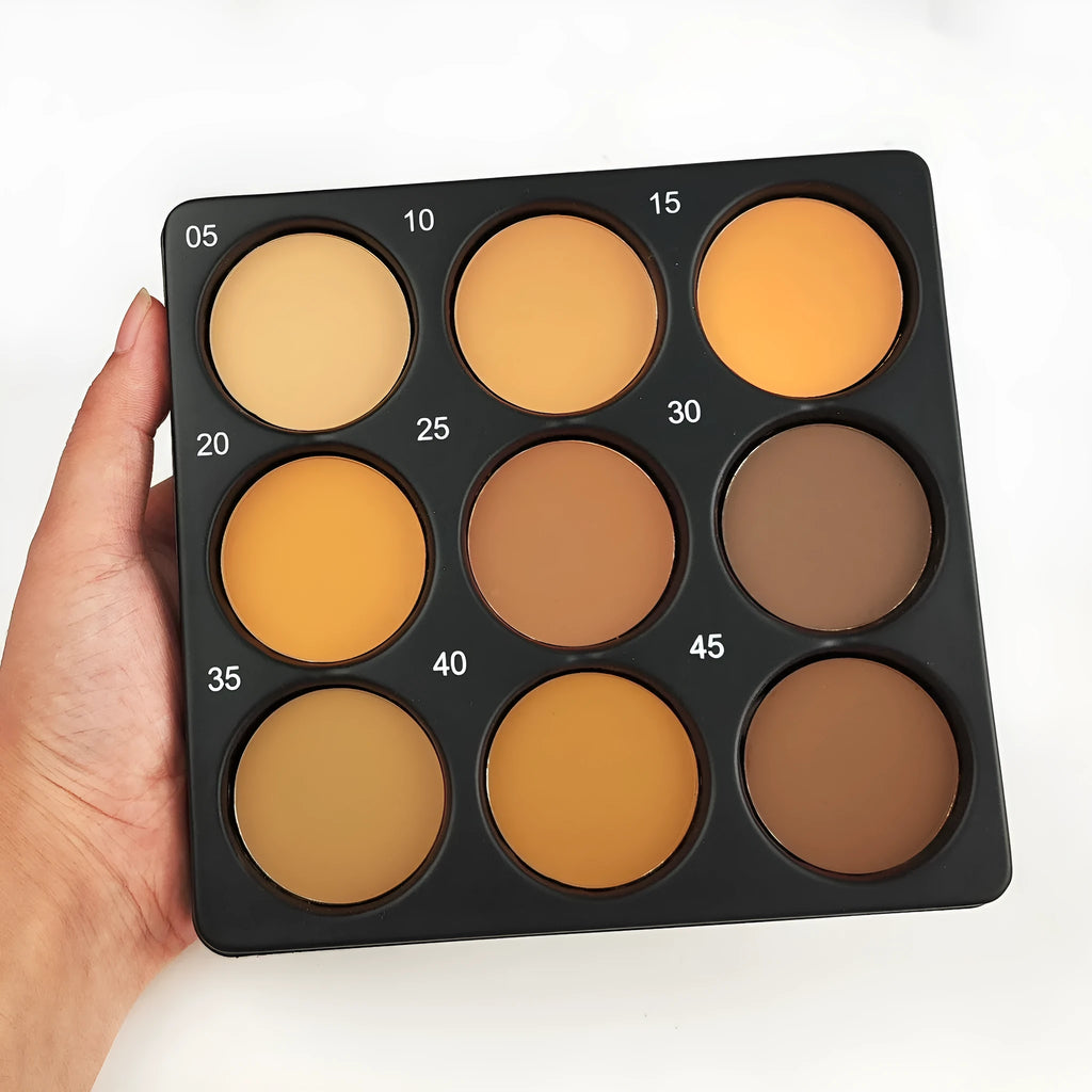 Makeup palette showing nine dark matte eyeshadow colours with waterproof long-lasting formulation