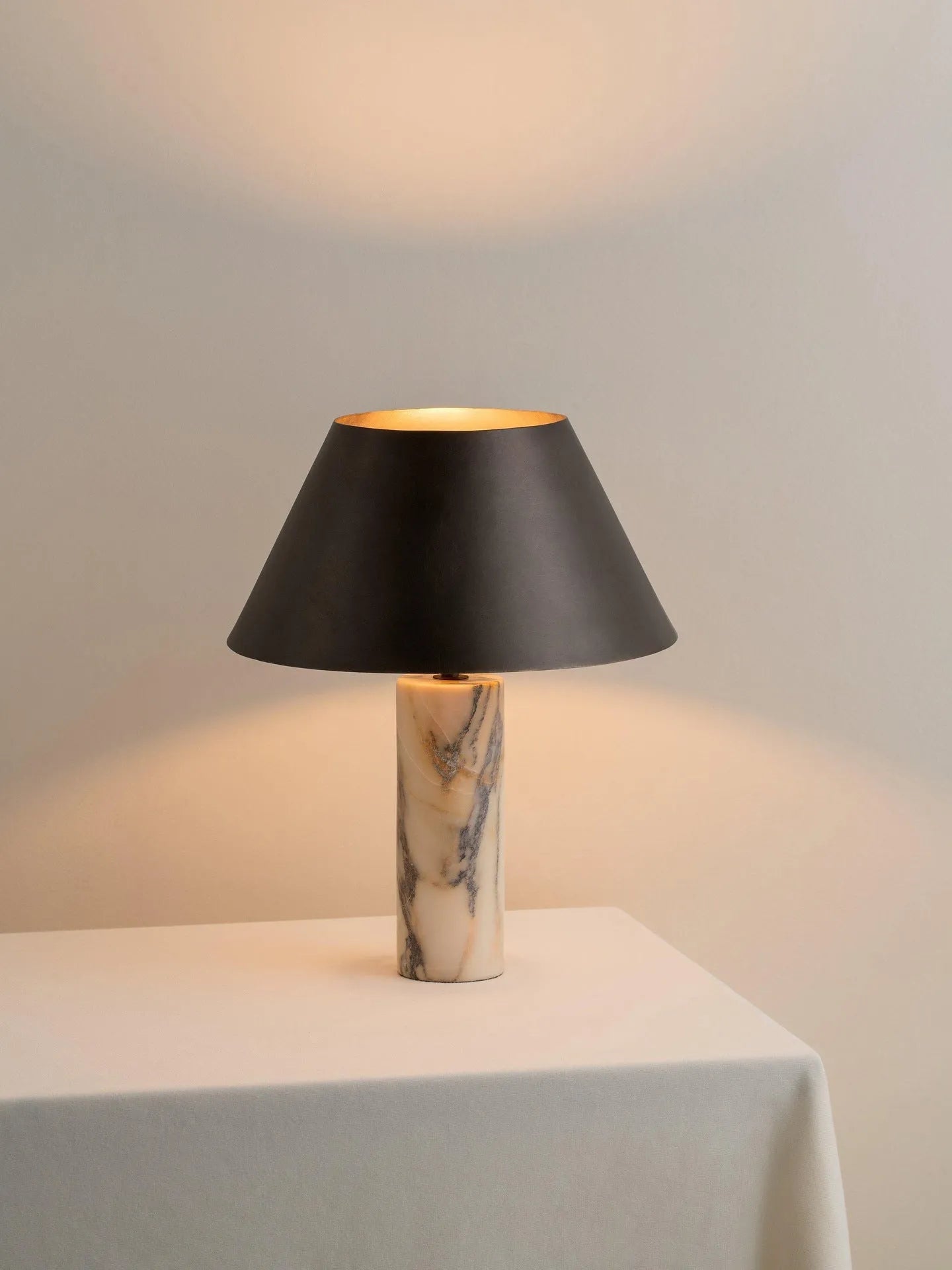 Modern black marble table lamp with contemporary minimalist design for home decoration