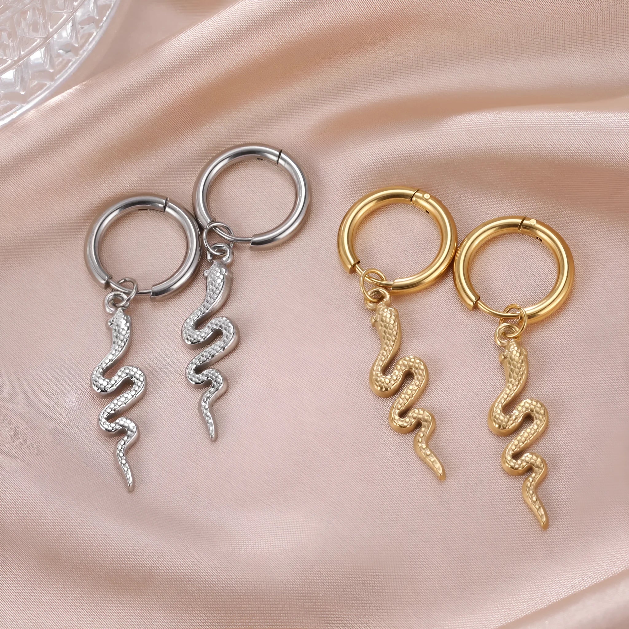Gold plated snake-shaped vintage clip-on earrings with stainless steel construction