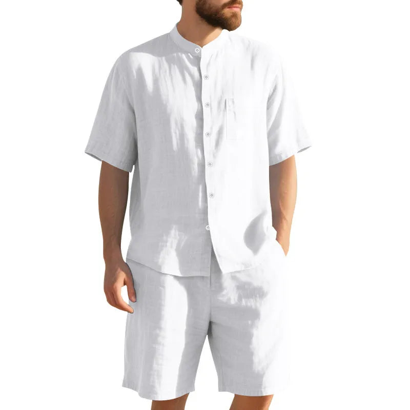 Men's light blue linen-blend summer suit with short sleeve shirt jacket and matching shorts on a hanger.
