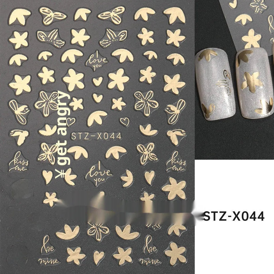 Close-up of a cartoon-style nail sticker with black and silver strips and a love pattern design on a fingernail.