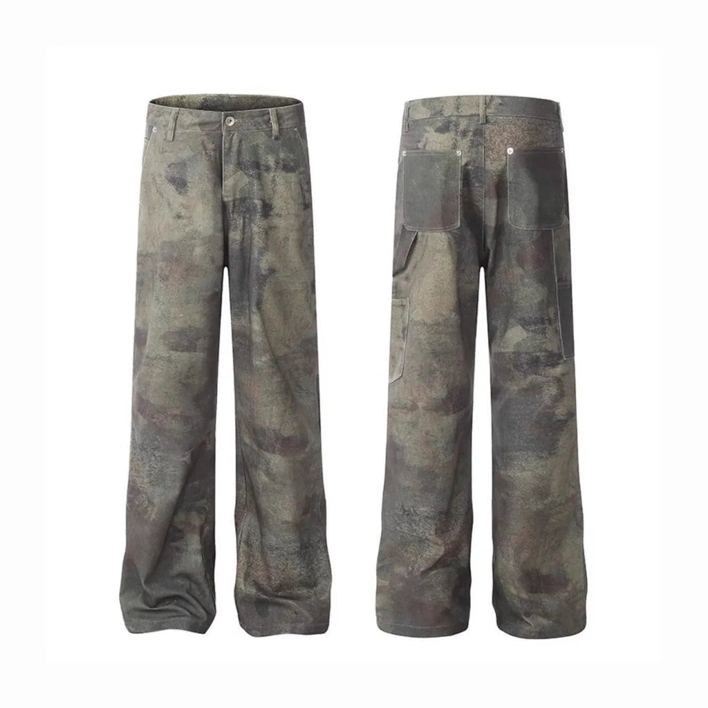 Man wearing retro digital camouflage print straight-leg jeans in cotton denim.