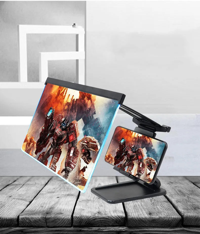 Black foldable mobile phone screen magnifier with detachable phone holder on a desk