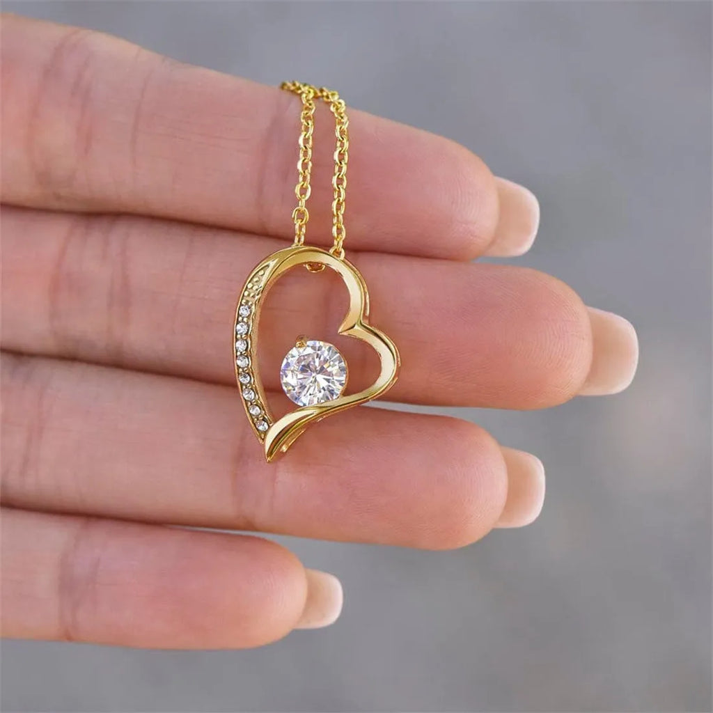 Hollow heart-shaped necklace in silver or gold finish with gift box presentation options