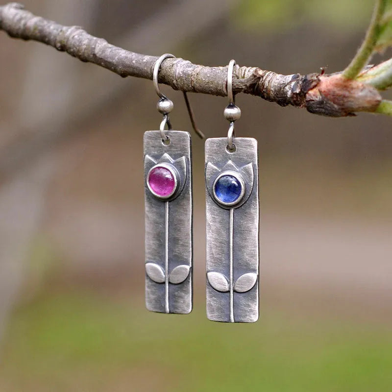 Antique finish red sapphire earrings with geometric ellipse shape in retro style