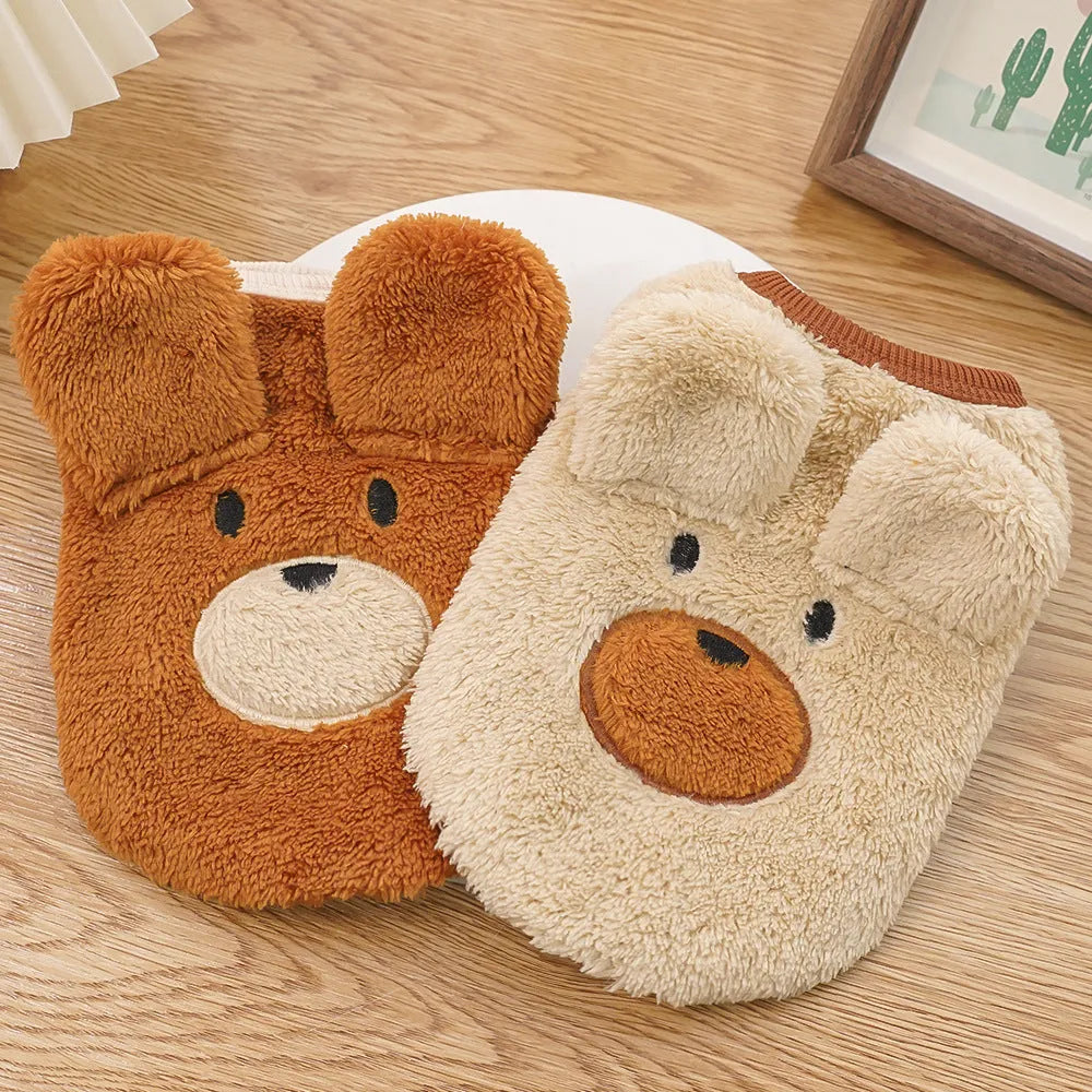 Cream fleece-lined pet dog clothes with brown bear ears on a white background, side view