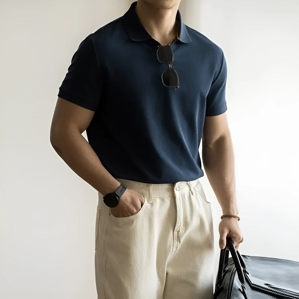 American-style blue cotton polo shirt with short sleeves on hanger