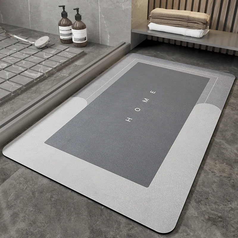 Blended fabric bathroom floor mat in oval and rectangular shapes on a tiled floor.