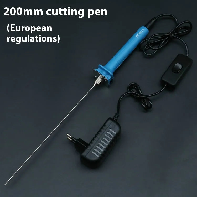 Blue plastic-handled electric foam cutter pen with adapter on a work surface.