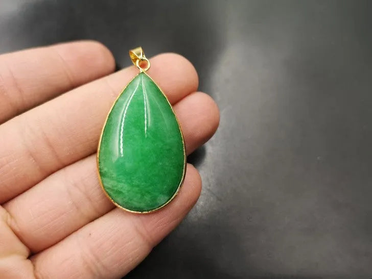 Green jade water drop pendant with white background gray jade and safety buckle