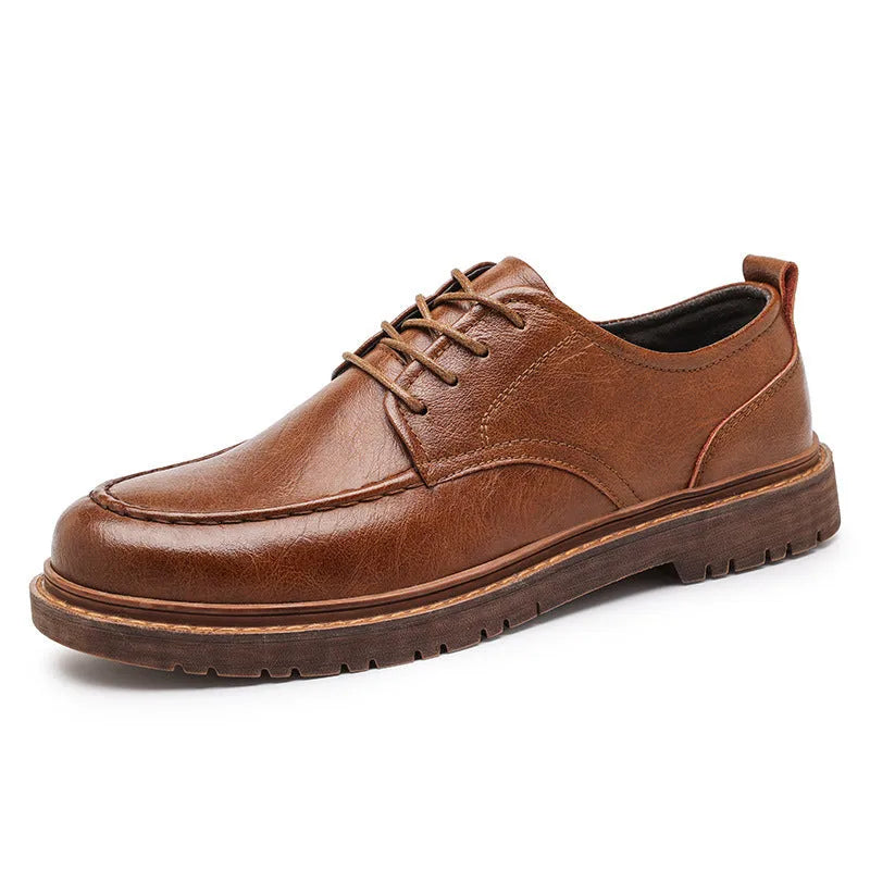 Men's black and brown casual leather shoes with round toe and flat rubber sole.