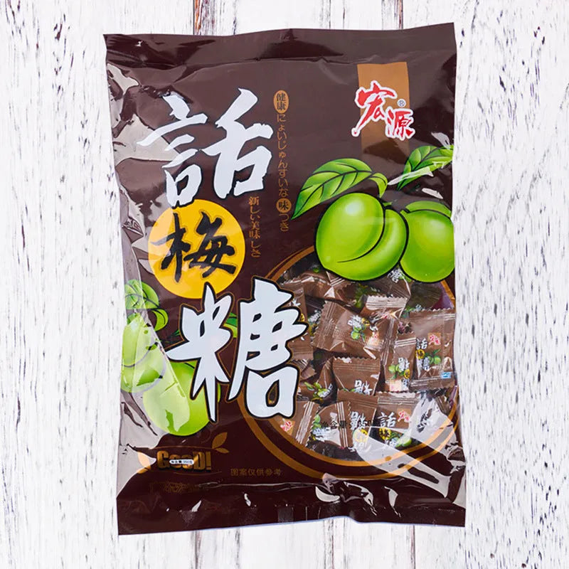 Three separate bags of hard candy: guava flavour, plum sugar flavour, and tangerine peel flavour.