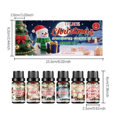 Christmas aromatherapy oil set showing 60ml warmer unit and six 10ml essential oil bottles